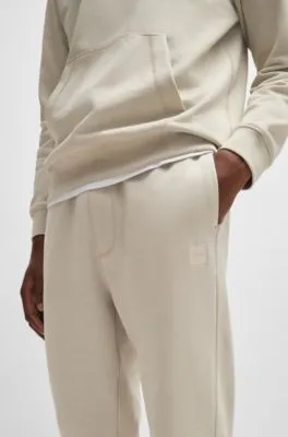 Cotton-terry tracksuit bottoms with logo patch