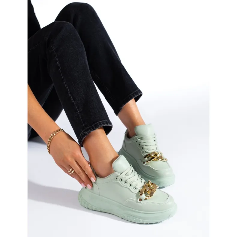 Light green women's sneakers with chain