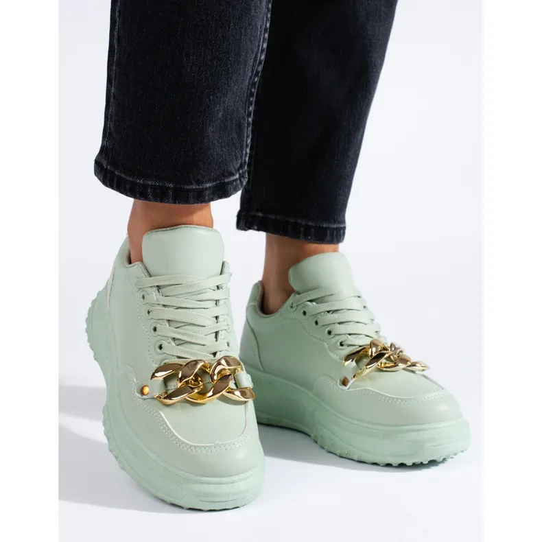 Light green women's sneakers with chain